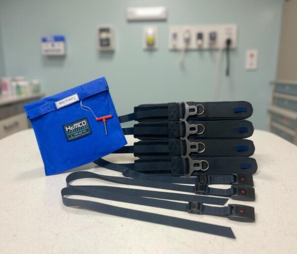 A modified patient restraint set on a hospital bed